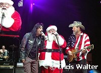 Alice Cooper, Santa Claus and Ted Nugent at Alice Cooper's Christmas Pudding show for his Solid Rock Foundation Charity at Dodge Theatre in Phoenix, Arizona, December 18th 2004. Photo by Chris Walter/Photofeatures.