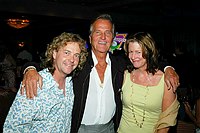 Photo of Pat Boone (c) with Jack Blades of Nightranger and his wife Mollie