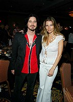 Photo of Gilby Clarke and Daniella Clarke<br>at the 9th Annual Alice Cooper Celebrity Golf Tournament in Scottsdale, Arizona, May 1st 2005.  Photo by Chris Walter/Photofeatures.