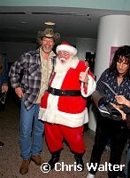 Ted Nugent and Santa Claus at Alice Cooper's Christmas Pudding show for his Solid Rock Foundation Charity at Dodge Theatre in Phoenix, Arizona, December 18th 2004. Photo by Chris Walter/Photofeatures.