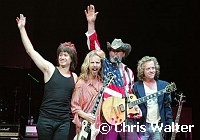 Michael Cartellone, Tommy Shaw, Ted Nugent and Jack Blades in Damn Yankees which played together for first time in 10 years at Alice Cooper's Christmas Pudding show for his Solid Rock Foundation Charity at Dodge Theatre in Phoenix, Arizona, December 18th 2004. Photo by Chris Walter/Photofeatures.