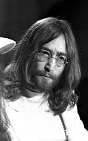 Beatles 1969 John Lennon  at Heathrow Airport.