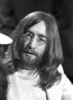 Beatles 1969 John Lennon  at Heathrow Airport.