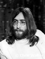 Beatles 1969 John Lennon at Heathrow Airport.