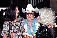 Photo of Emmylou Harris, Nudie Cohn and Dolly Parton<br> Chris Walter<br>