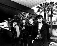 Photo of Echo & The Bunnymen 1981 Will Sargeant, Pete de Freitas, Les Pattinson and Ian McCulloch at the Tropicana Motel in Hollywood.