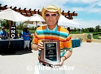 Glen Campbell with presentation for his induction in Arizona Music and Entertainment Hall Of Fame at the 9th Alice Cooper Golf Tournament in Scottsdale to benefit his Solid Rock Foundation Charity, May 2nd 2005. phoo by Chris walter/Photofeatures.