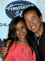 Photo of Smokey Robinson 2007 with granddaughter Lyric