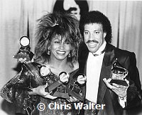 Tina Turner 1985 4 Grammy Awards 1985 with Lionel Richie and his award