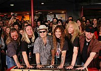 Photo of Iron Maiden inducted into Hollywood Rockwalk at Guitar Center on Sunset Blvd in Hollywood, August 19th 2005. l-r Dave Murray,Nicko McBrain, Bruce Dickinson, Steve Harris, Janick Gers and Adrian Smith. Photo by Chris Walter/Photofeatures.