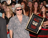 Photo of Bruce Dickinson of Iron Maiden inducted into Hollywood Rockwalk at Guitar Center on Sunset Blvd in Hollywood, August 19th 2005. Photo by Chris Walter/Photofeatures.