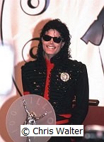 Michael Jackson 1990 with award for selling 100 million records in the 1980's